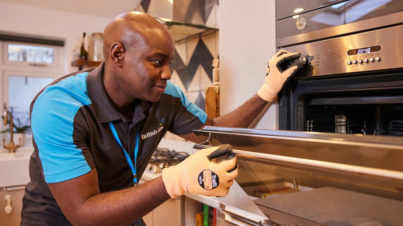 British Gas engineer fixing an appliance